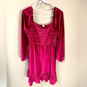 Lauren Conrad bright pink velvet dress with long sleeves.